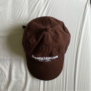 Dark Brown cap with lettering on front